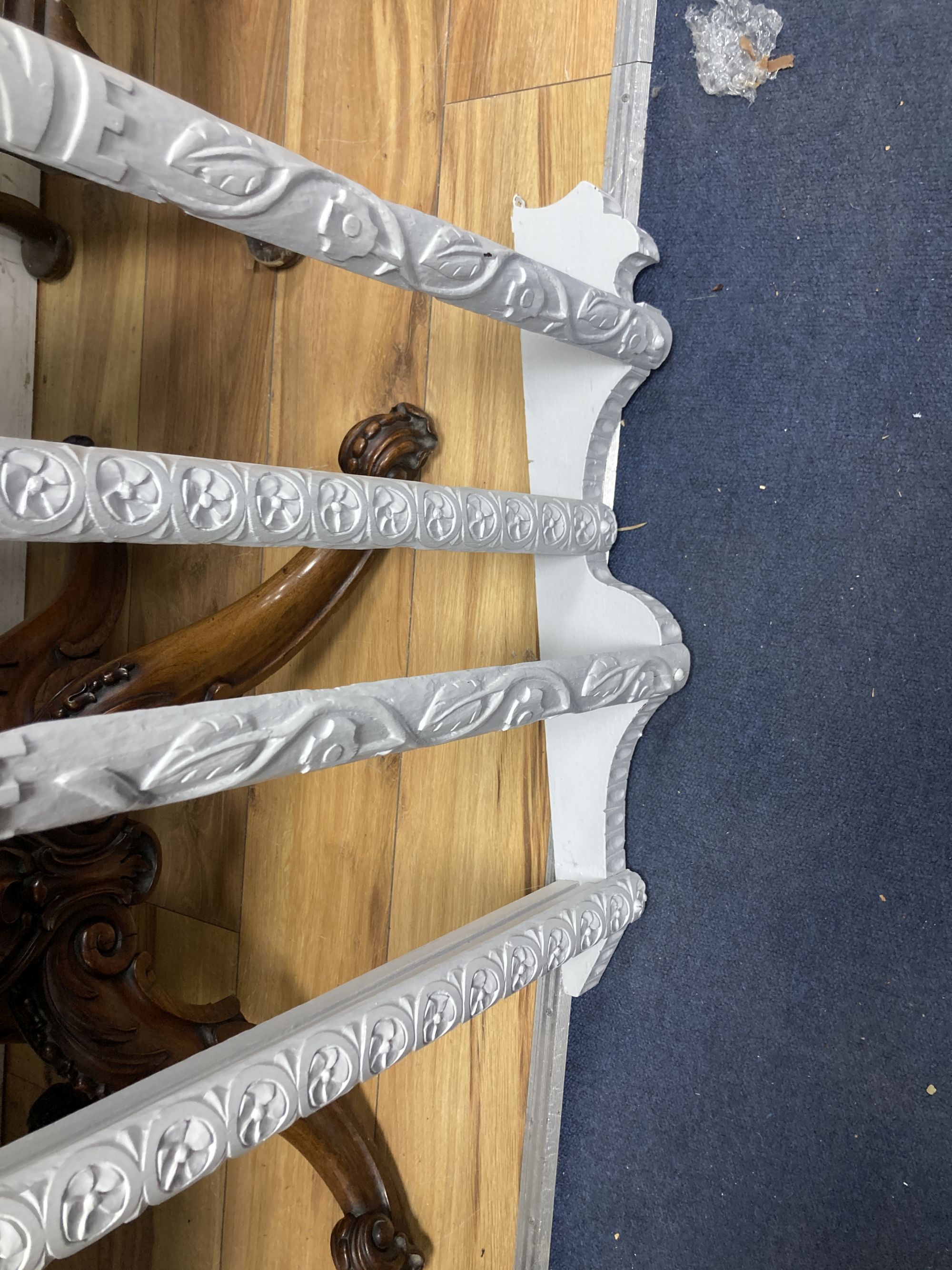 A 19th century carved painted wood plate rack, length 122cm, height 56cm